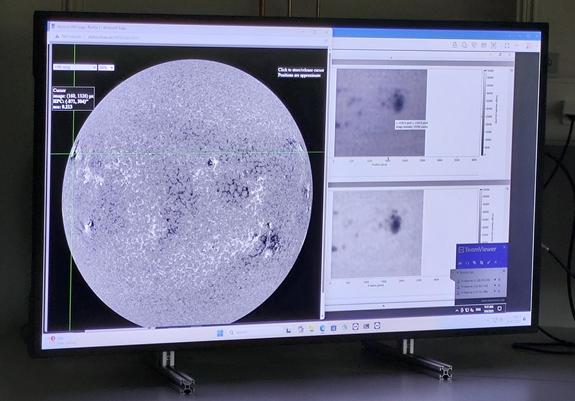 Zoom-in on the contents of one of the large screens: Various windos showing a full-disk magnetogram image of the Sun and two versions of a zoom onto an active region.