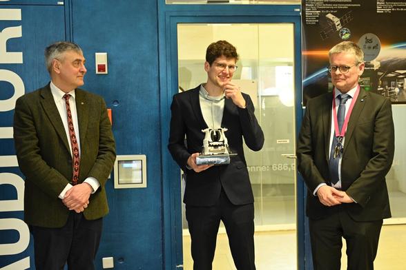 Patrick Bambach (center) with model of PEP-JEI