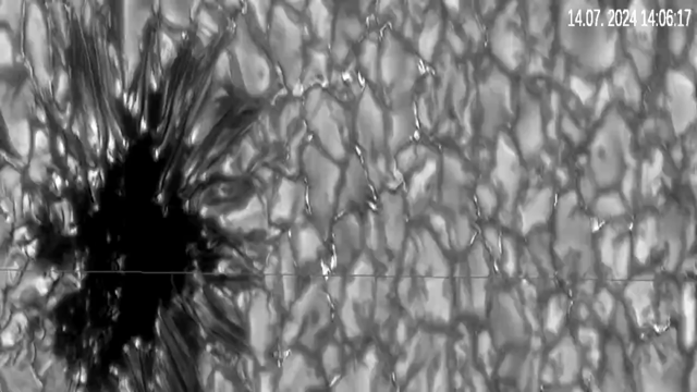 sunspot and solar granulation in solar atmosphere evolving over time